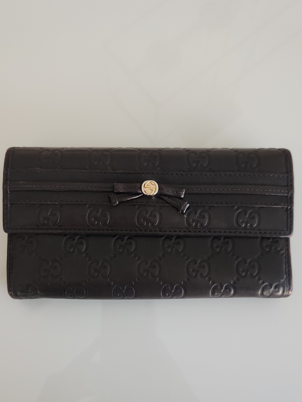 Gucci Black Embossed GG Continental Wallet with Bow Detail. Perfect FALL color